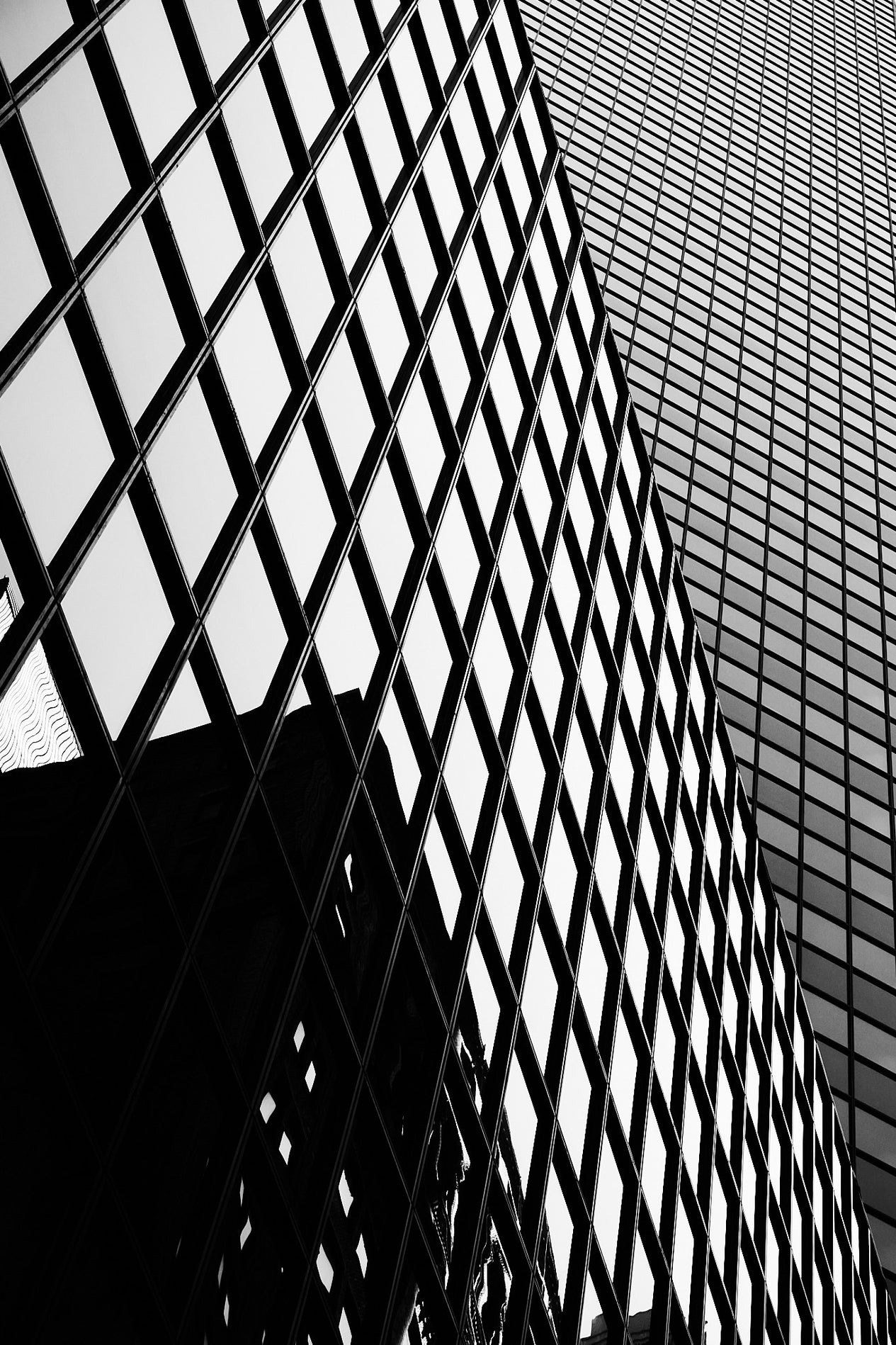 Black and white geometric pattern on a building facade