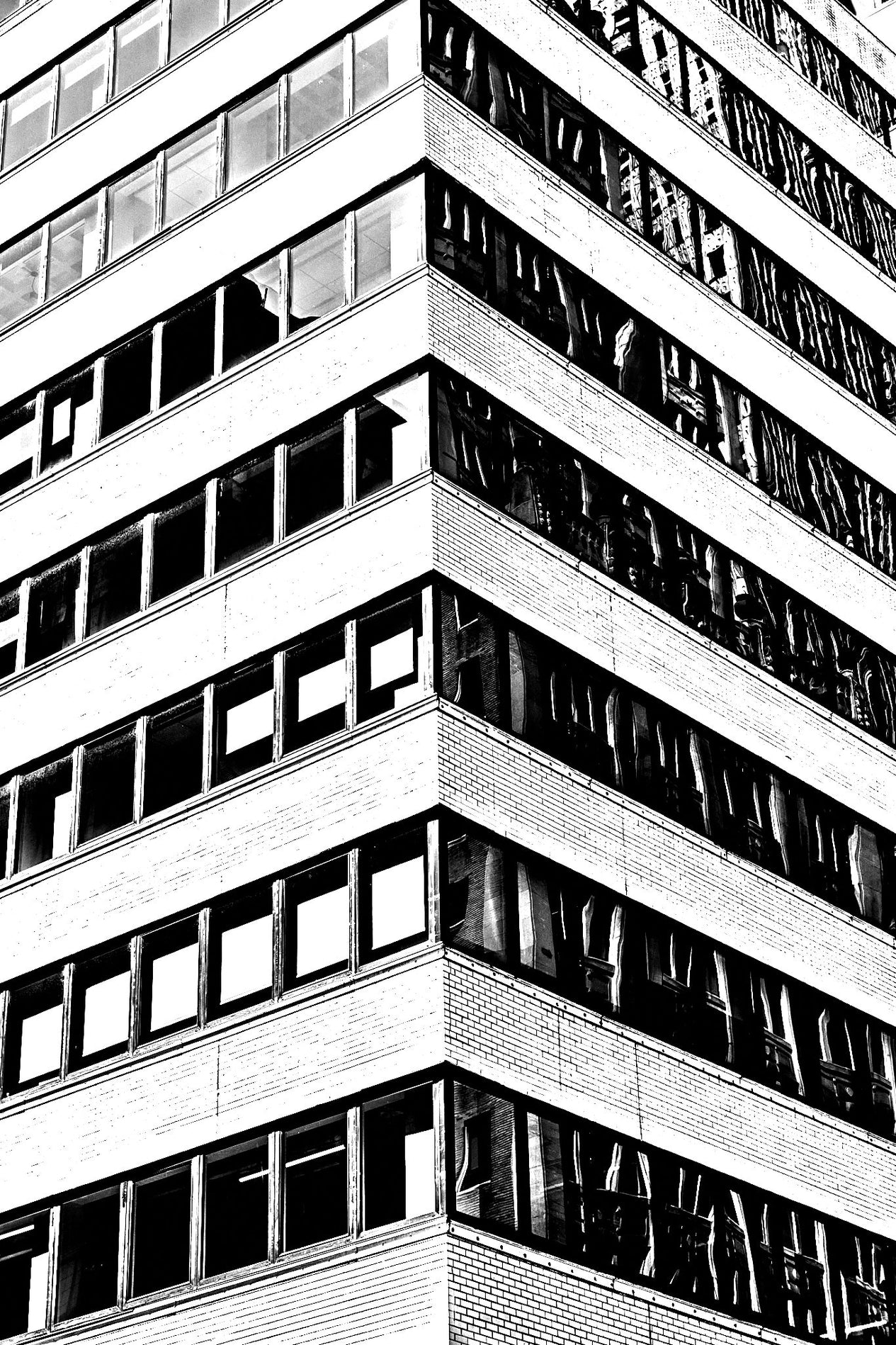 Black and white architectural photograph of a building corner