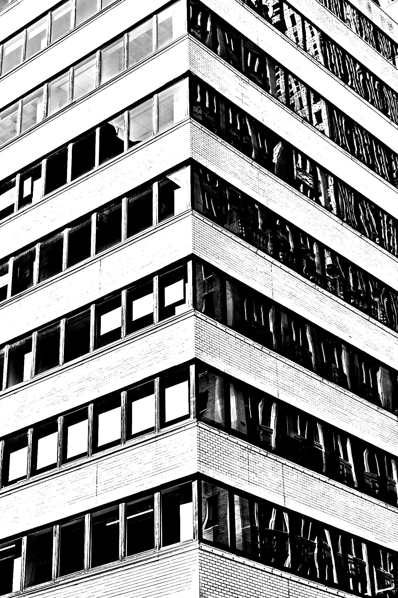 Black and white architectural photograph of a building corner