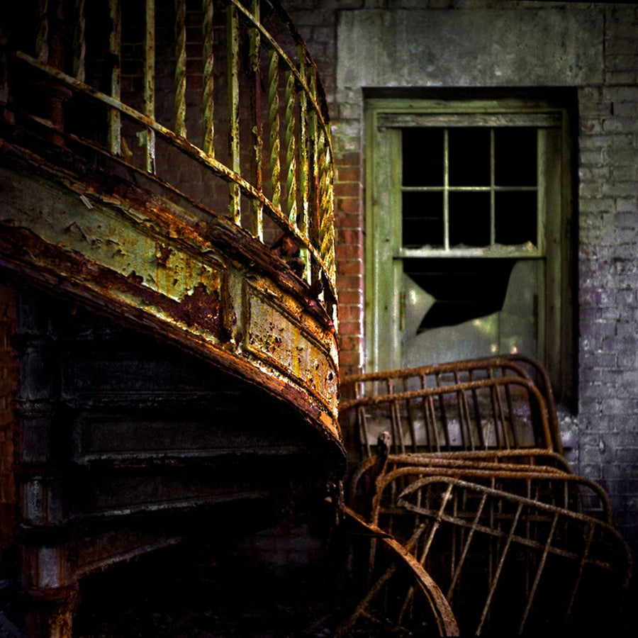 Limited Edition Print of a rusty metal staircase in a abandoned building.