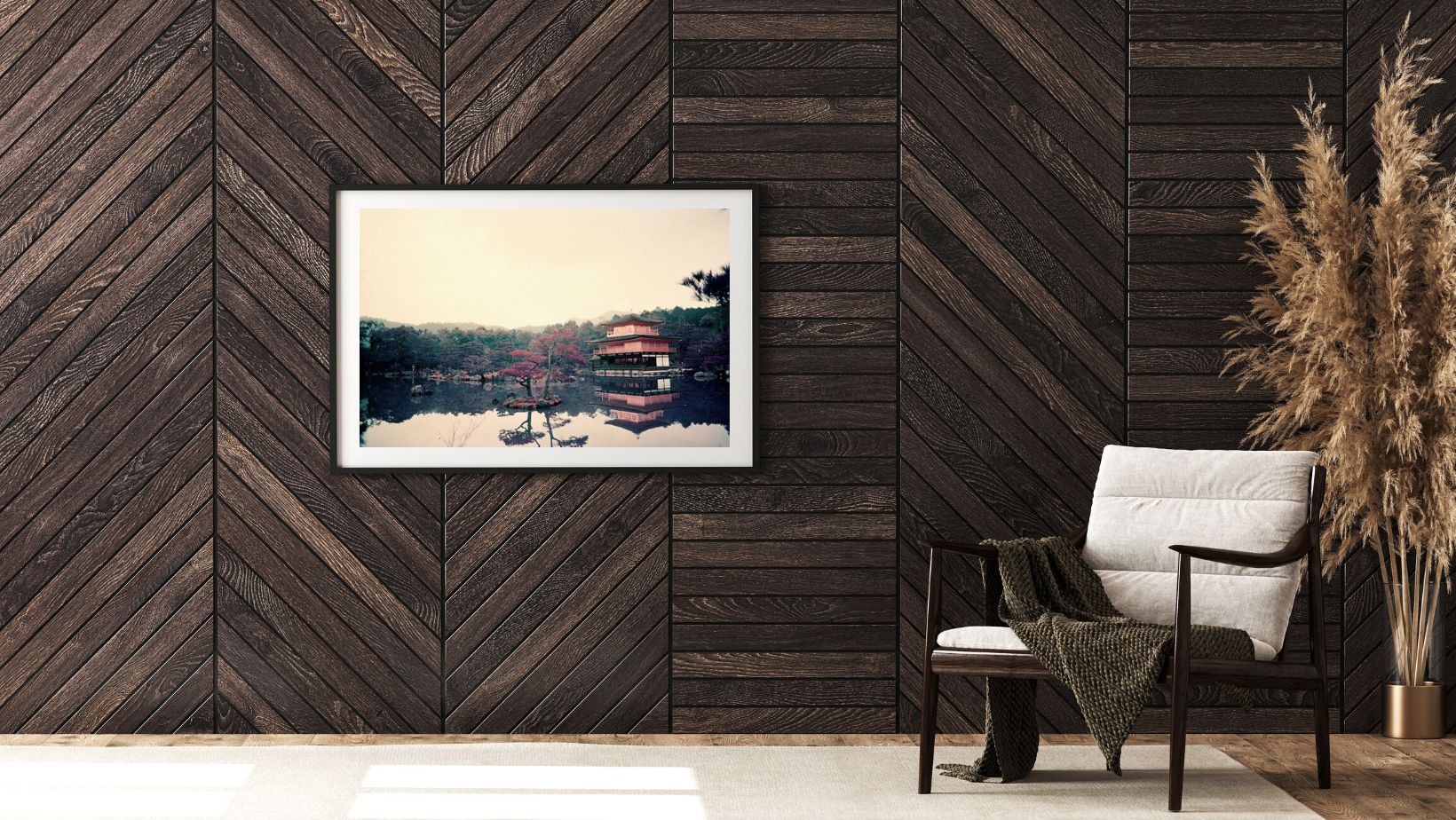 Modern interior with a chevron-patterned wooden wall, a framed picture, a white chair, and decorative elements.