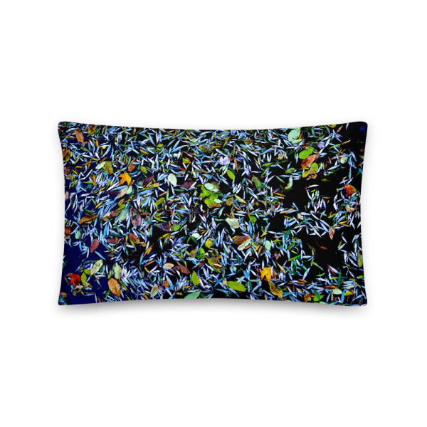 Rectangular pillow with a photograph of a pond covered with flower petals