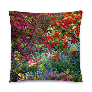 Square pillow with the photograph of a shaded and flowery spot in a park