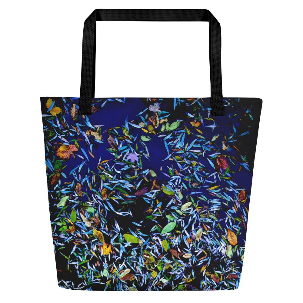 Back of a large tote bag with the image of a pond covered with fallen flower petals (dark blue tones)