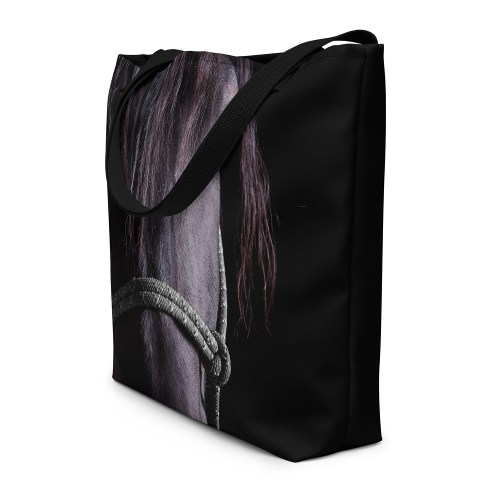 Sideview of a Large black tote bag with a portrait of a black horse on one side
