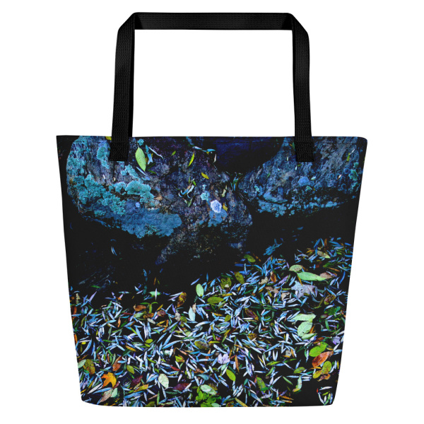 Front side of a large tote bag with the image of a pond covered with fallen flower petals (dark blue tones)