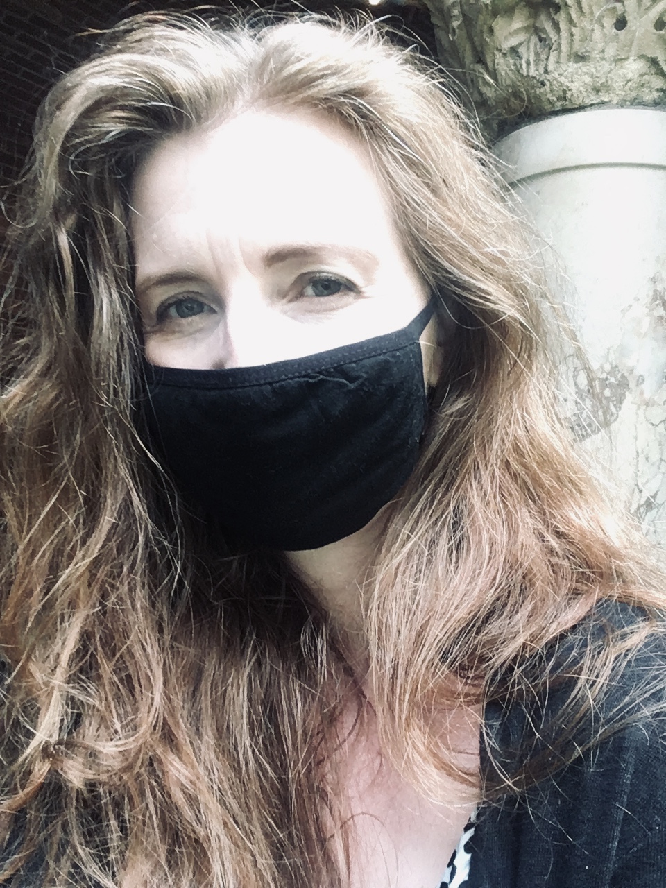 Portrait of Aurelie wearing a mask during the pandemic