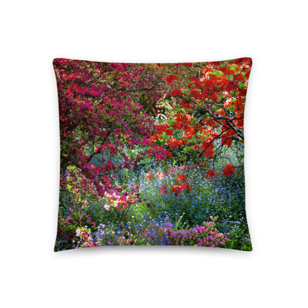 Square throw pillow with the photograph of a shaded and flowery spot in a park