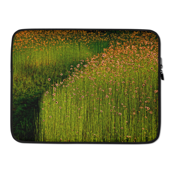 Laptop case with the photograph of a field of orange flowers