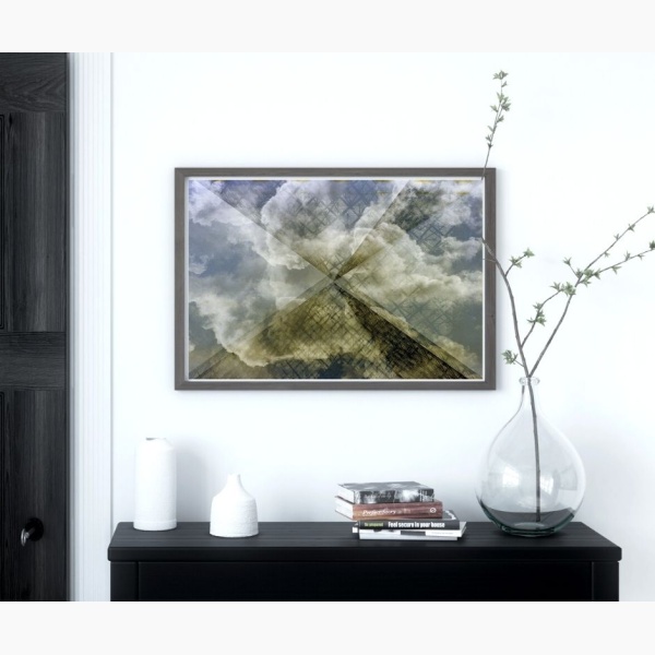 Print of reflections on Le Louvre pyramid, hanging above a console table