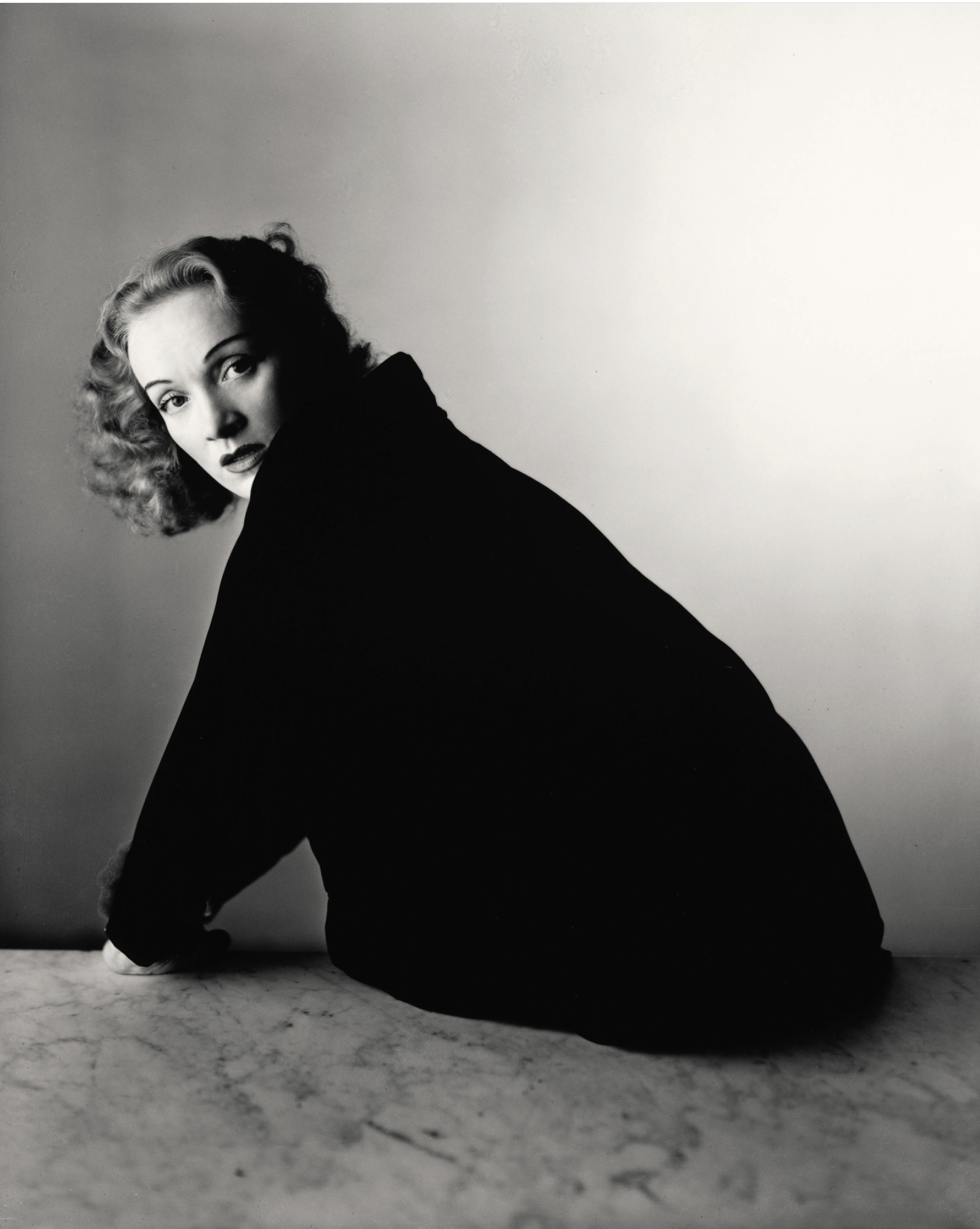 Actress Marlene Dietrich turning her head to look at the camera