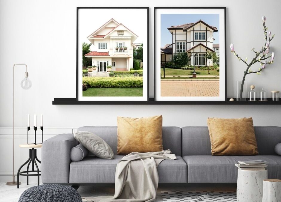 Diptyque prints of two houses hanging in a living room