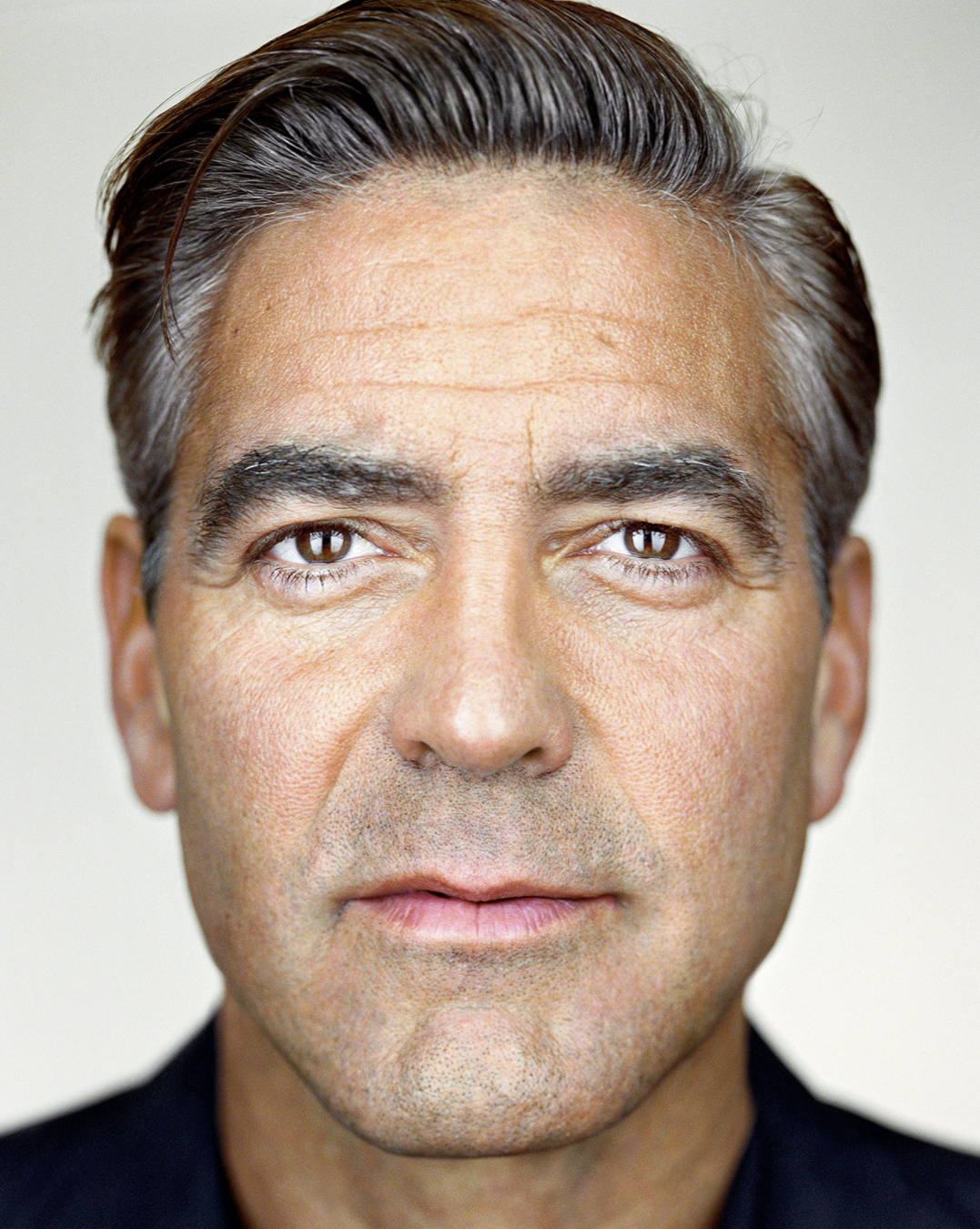 Actor George Clooney, looking straight at the camera