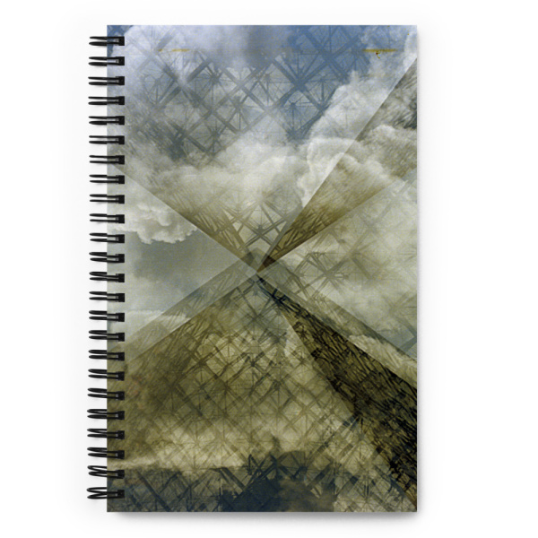Notebook with on its cover a picture of reflections in the pyramid at Le Louvre, in Paris