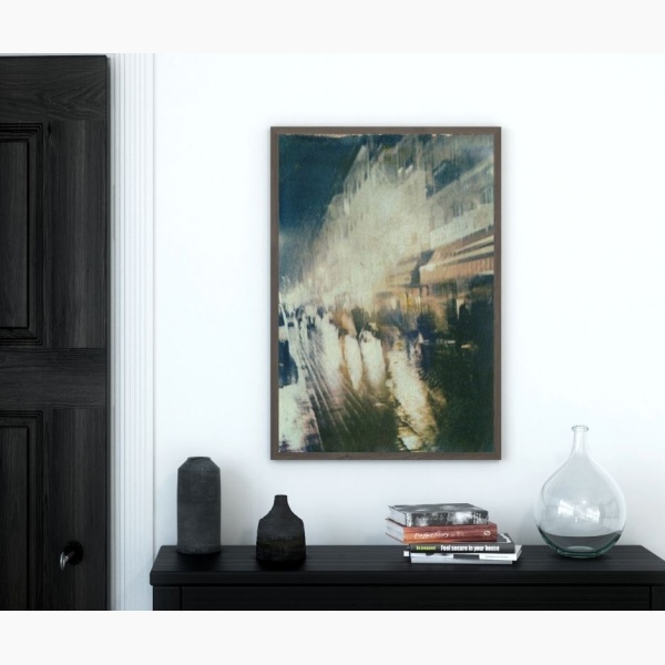 Print of a rainy evening in Paris, hanging above a console table in an entryway