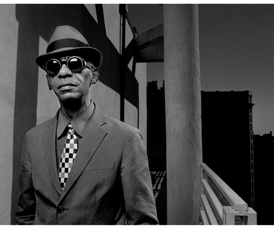 Saxophonist Roscoe Mitchell with dark sunglasses outside a building