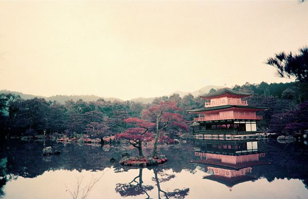 Japanese temple reflected on a lake