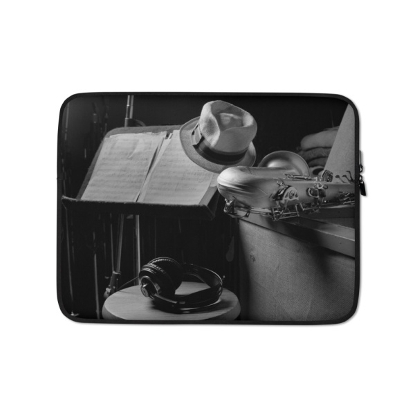 Laptop sleeve with the image of a recording studio on its cover