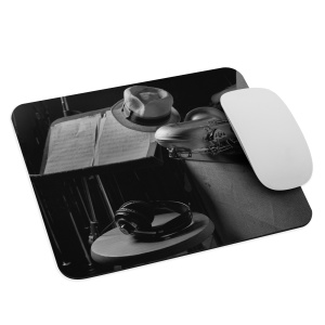 Mouse pad with an image of a recording studio on it