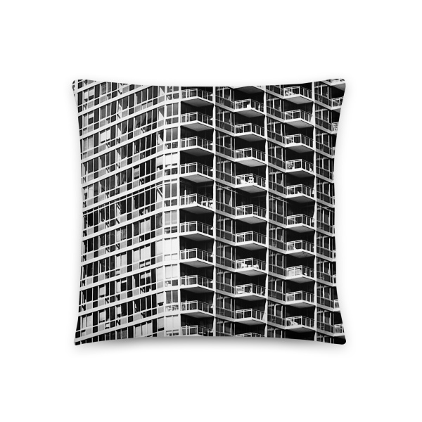 Large square pillow with a photograph of a skyscraper façade