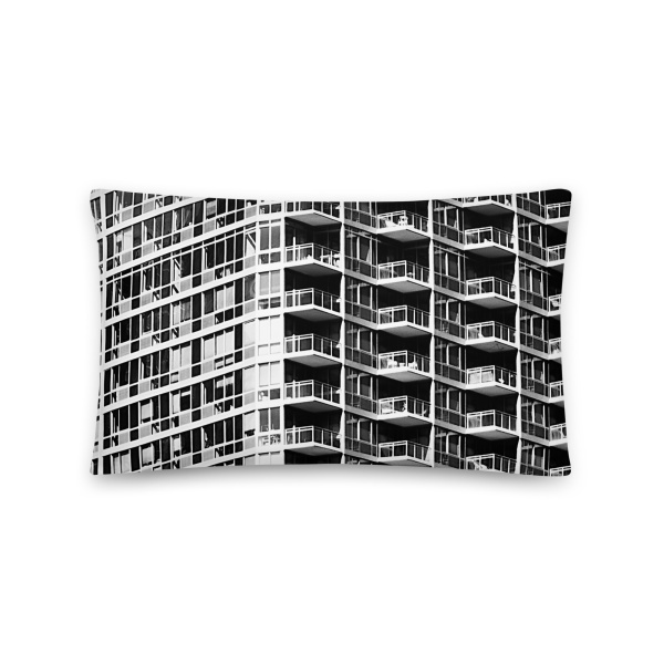 Small rectangular pillow with a photograph of a skyscraper façade