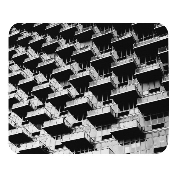 Mouse pad with a photograph of a skyscraper façade