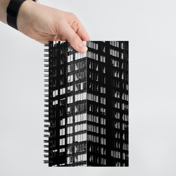 Notebook with a photograph of a skyscraper façade
