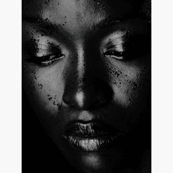 Close-up portrait of a young Black woman