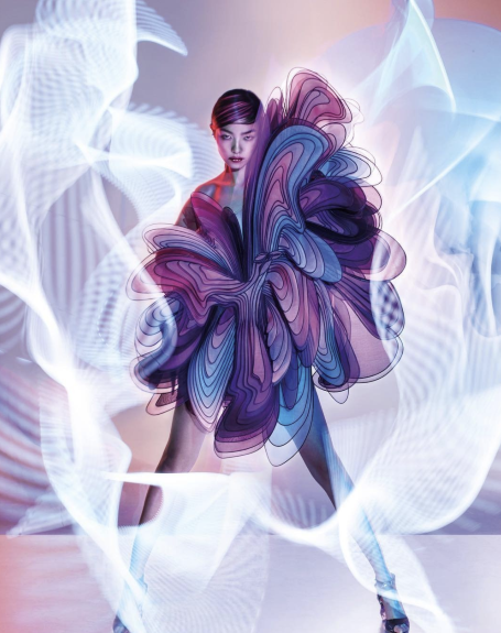 Model wearing a futuristic outfit surrounded by lights movements