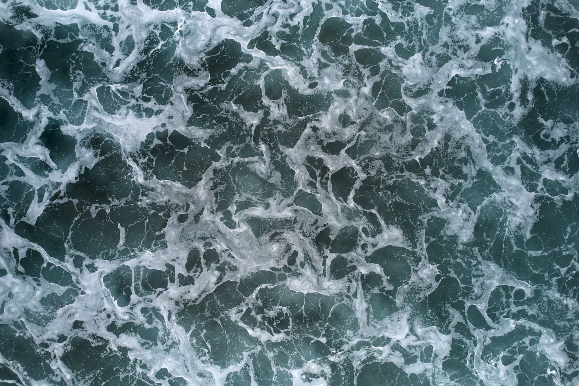 Limited edition print of an abstract aerial photography of surf and waves breaking