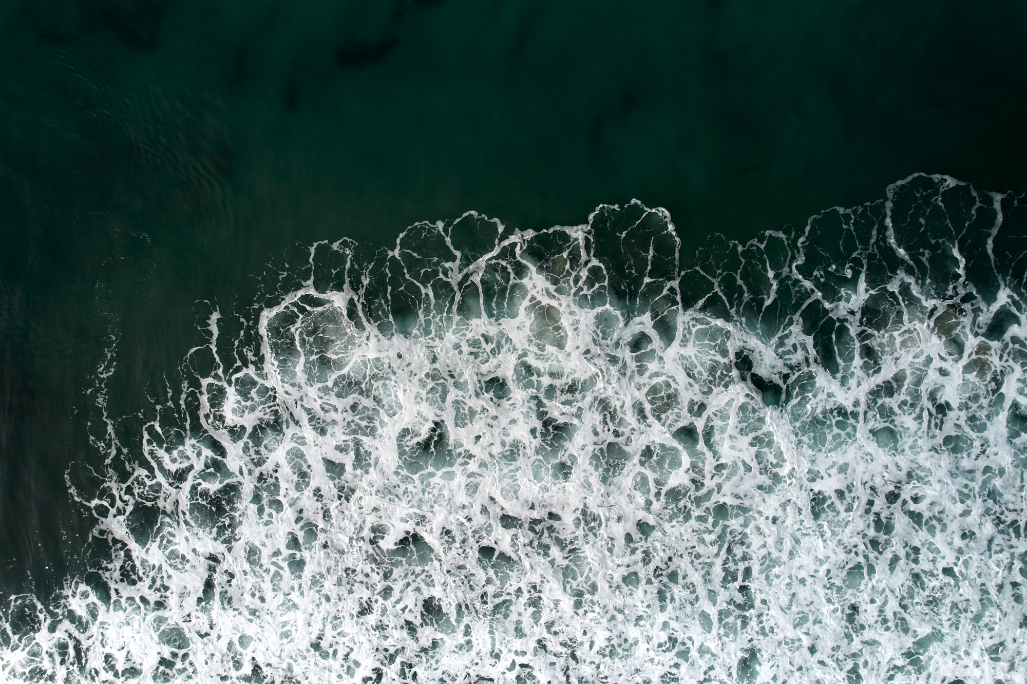 Limited edition print of an abstract aerial photography of surf and waves breaking