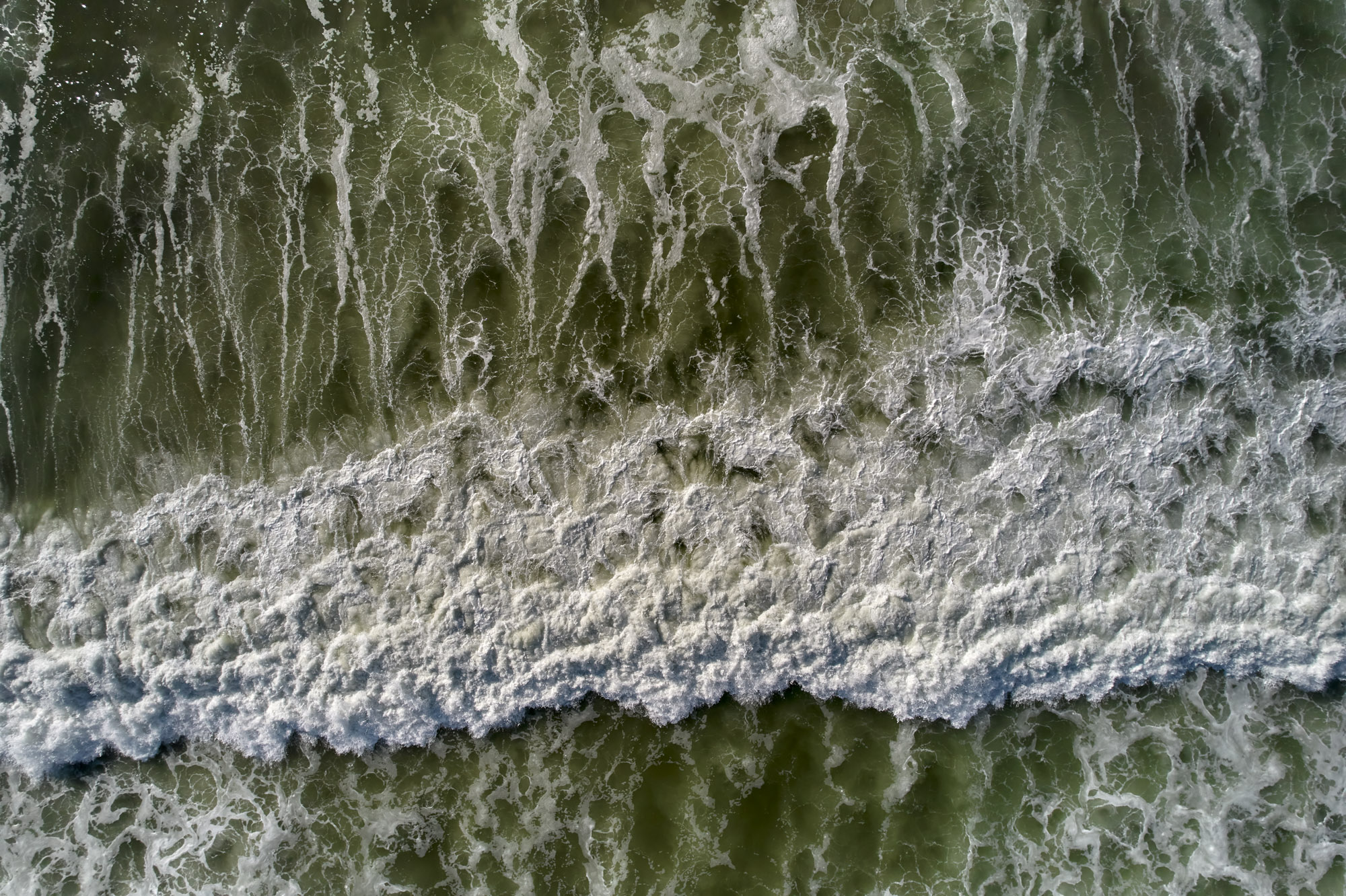 Limited edition print of an abstract aerial photography of surf and waves breaking